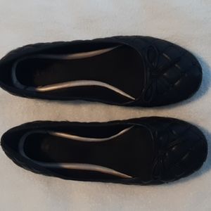 Black leather ballet slippers